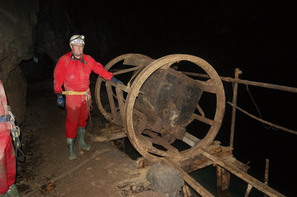 Robin Jones A.K.A Sweetie standing by the tippler at Powell's Lode within the Milwr Tunnel